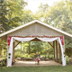 Outdoor wedding gazibo surrounded by trees at The Reserve Hall in Fort Wayne.